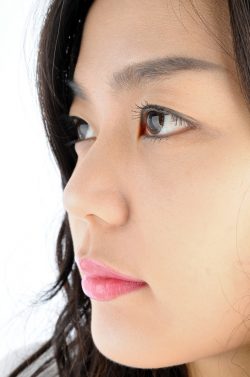 Woman with refreshed eyes after blepharoplasty